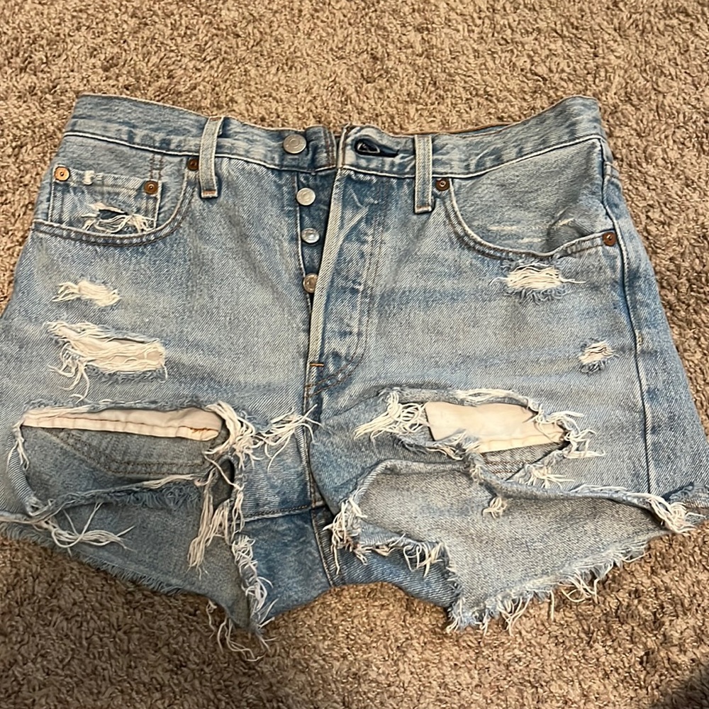 Ripped Levi’s Jean Shorts